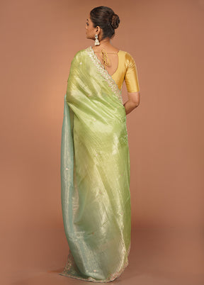 Green Tissue Silk Saree With Blouse Piece