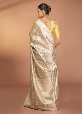 Cream Tissue Silk Saree With Blouse Piece