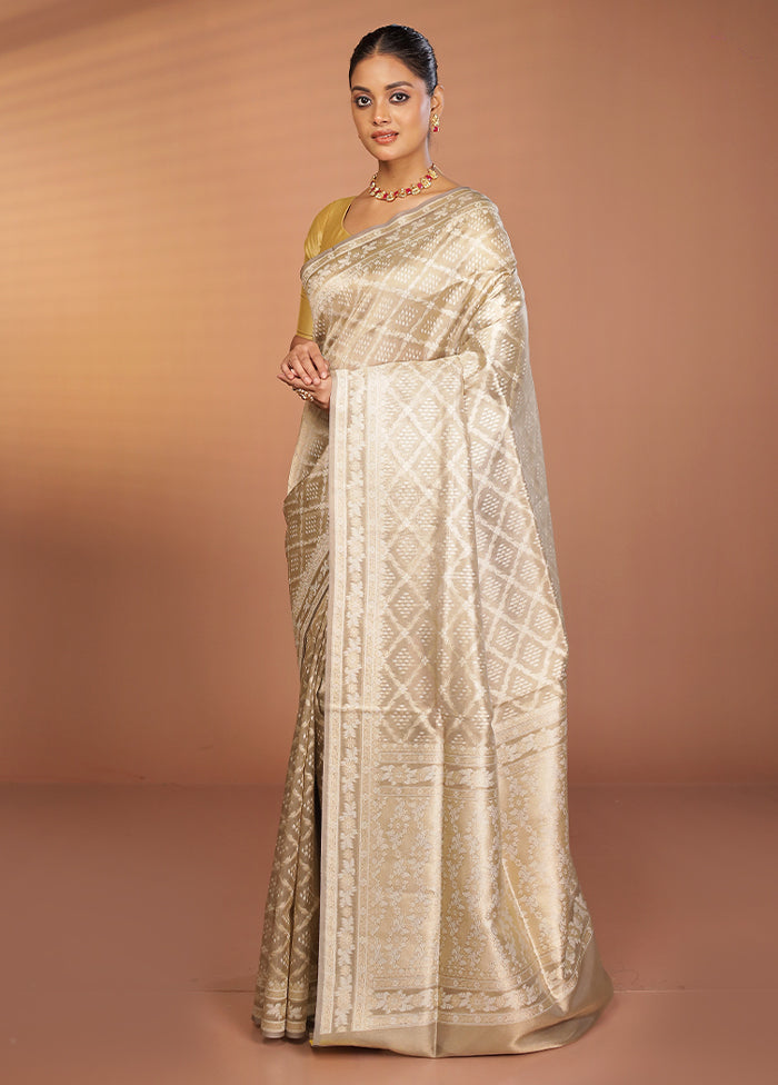 Cream Tissue Silk Saree With Blouse Piece