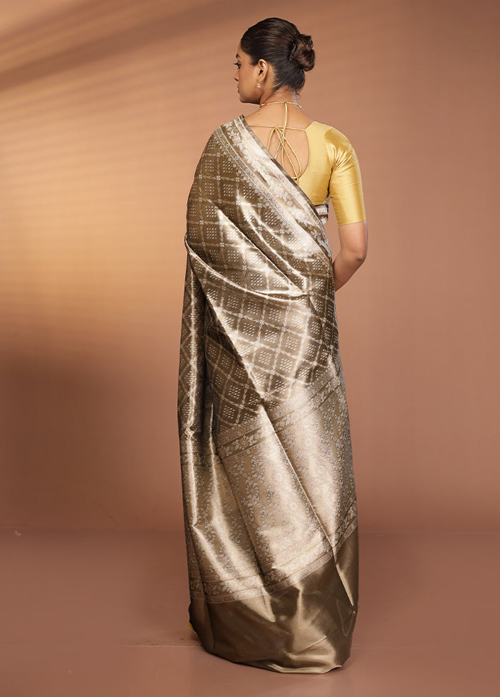 Cream Tissue Silk Saree With Blouse Piece