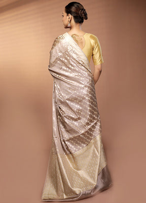 Cream Tissue Silk Saree With Blouse Piece