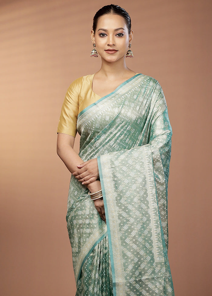 Green Tissue Silk Saree With Blouse Piece