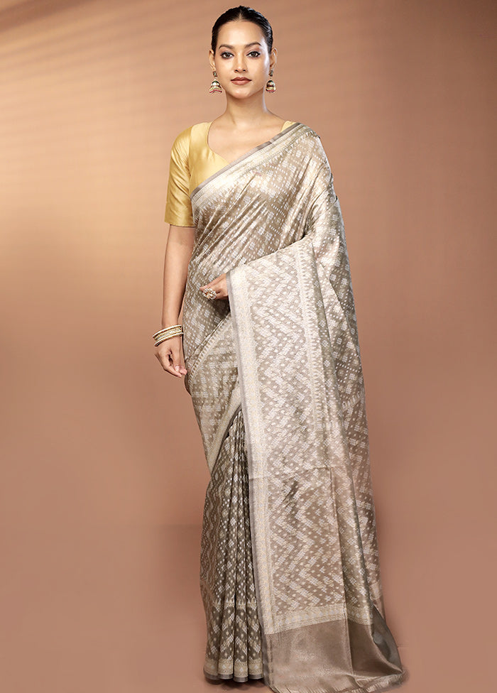Cream Tissue Silk Saree With Blouse Piece