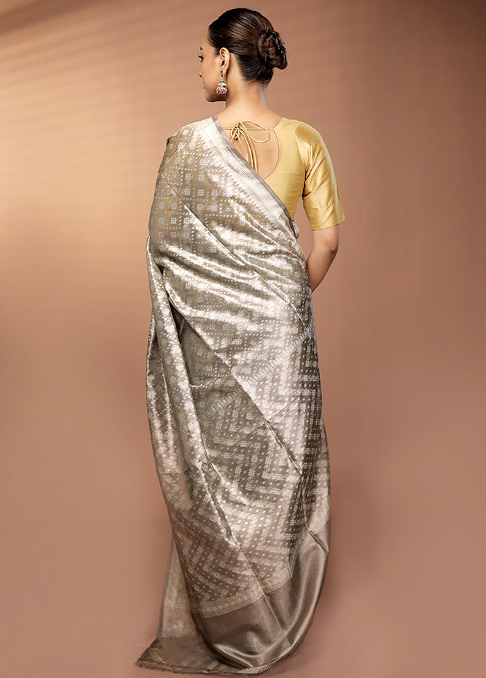 Cream Tissue Silk Saree With Blouse Piece