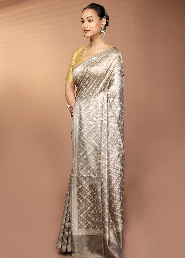 Cream Tissue Silk Saree With Blouse Piece