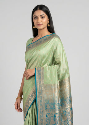 Green Banarasi Silk Saree With Blouse Piece