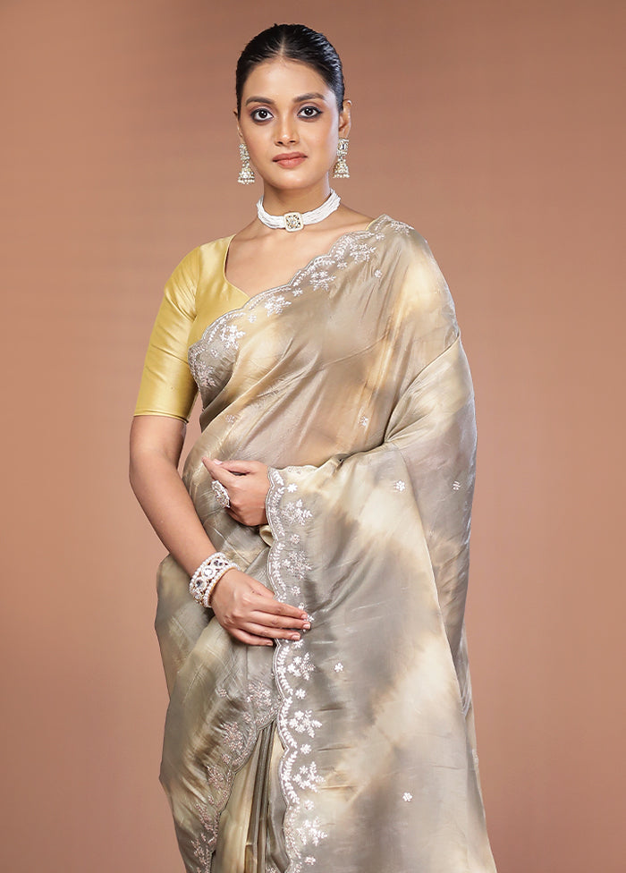 Cream Tissue Silk Saree With Blouse Piece