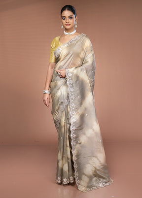 Cream Tissue Silk Saree With Blouse Piece
