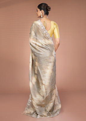 Cream Tissue Silk Saree With Blouse Piece