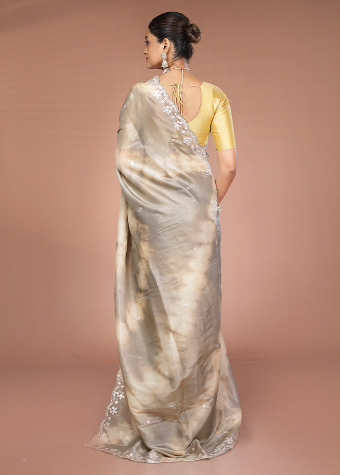 Cream Tissue Silk Saree With Blouse Piece