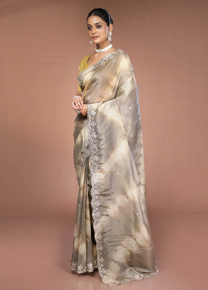 Cream Tissue Silk Saree With Blouse Piece