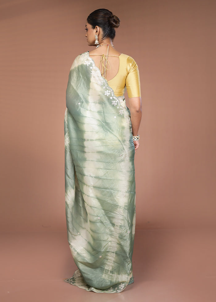 Green Tissue Silk Saree With Blouse Piece