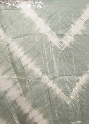 Green Tissue Silk Saree With Blouse Piece