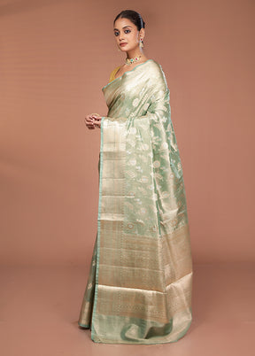 Green Tissue Silk Saree With Blouse Piece