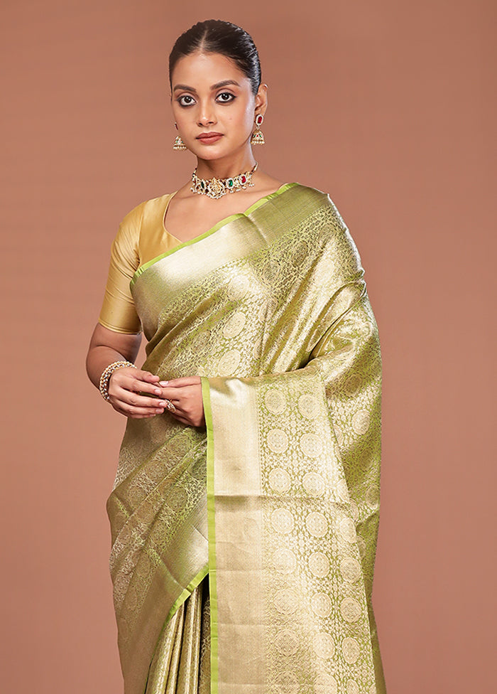 Green Tissue Silk Saree With Blouse Piece
