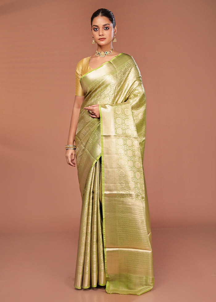 Green Tissue Silk Saree With Blouse Piece