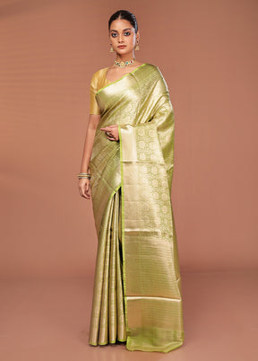 Green Tissue Silk Saree With Blouse Piece