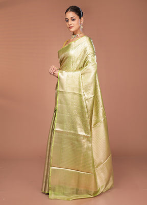 Green Tissue Silk Saree With Blouse Piece