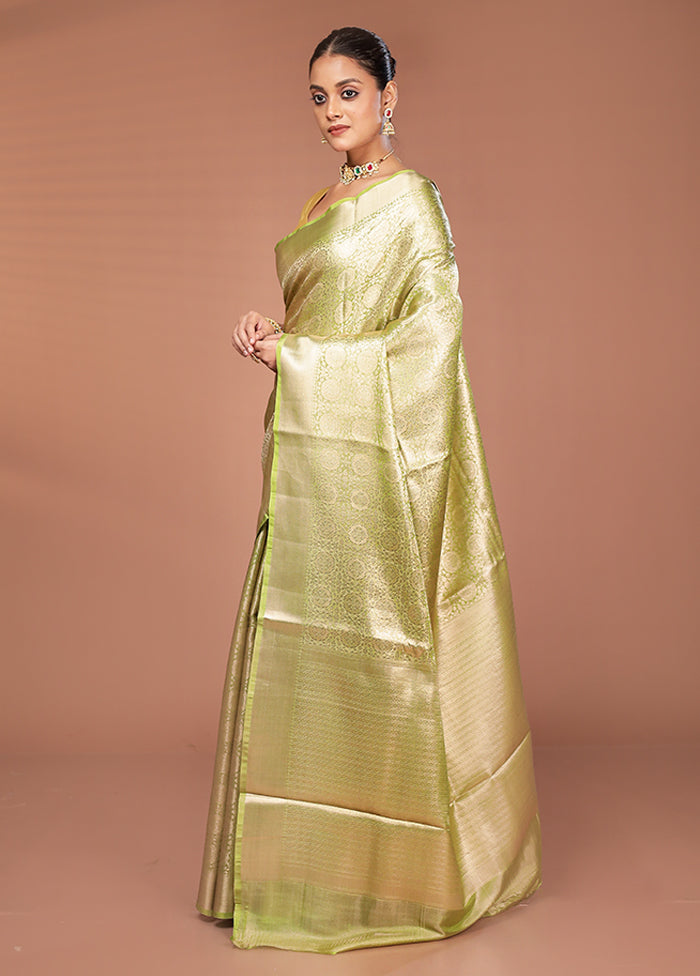 Green Tissue Silk Saree With Blouse Piece