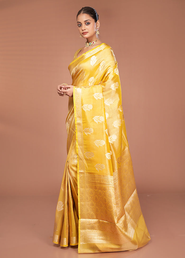 Yellow Tissue Silk Saree With Blouse Piece