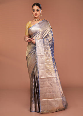 Green Tissue Silk Saree With Blouse Piece
