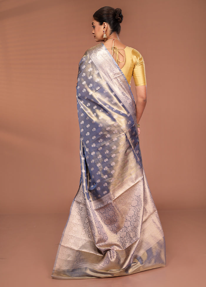 Green Tissue Silk Saree With Blouse Piece