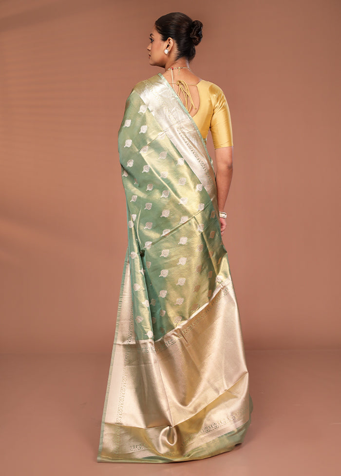 Green Tissue Silk Saree With Blouse Piece