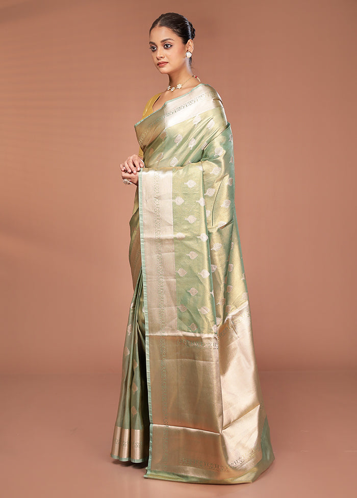 Green Tissue Silk Saree With Blouse Piece