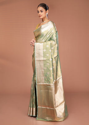 Green Tissue Silk Saree With Blouse Piece
