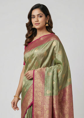 Green Tissue Silk Saree With Blouse Piece