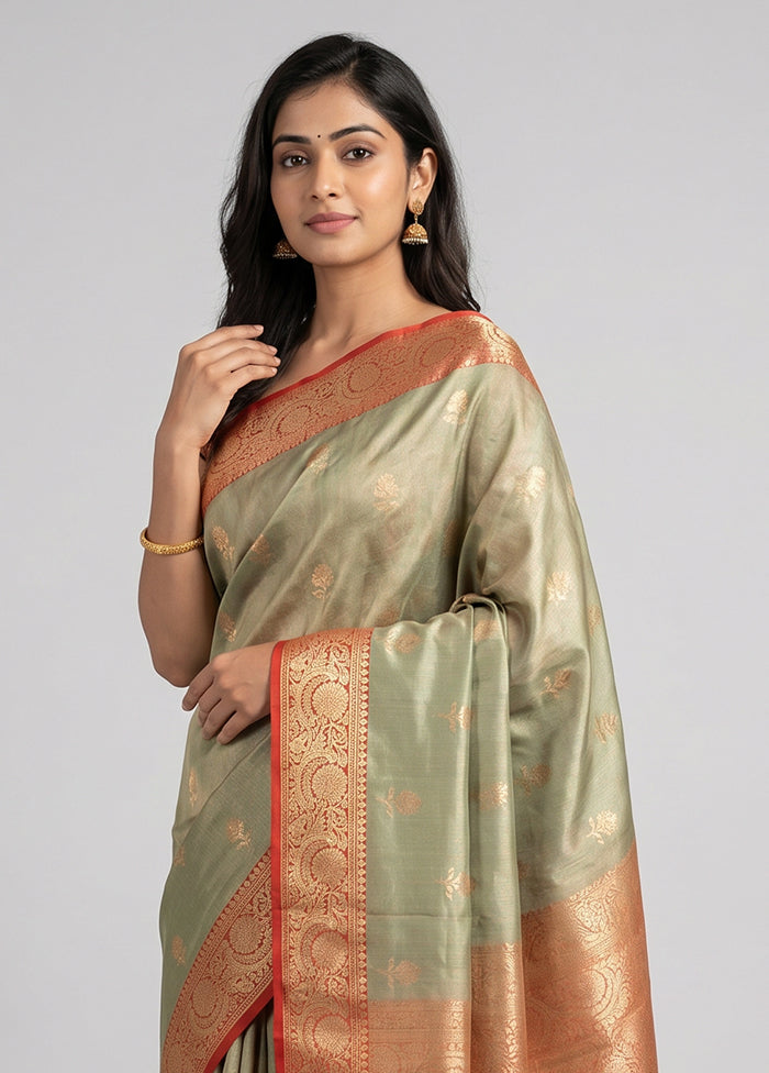 Green Tissue Silk Saree With Blouse Piece