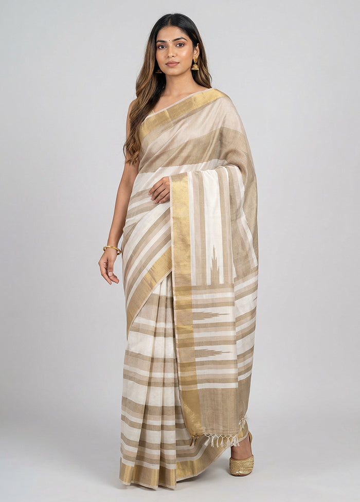Cream Handloom Tussar Pure Silk Saree With Blouse Piece