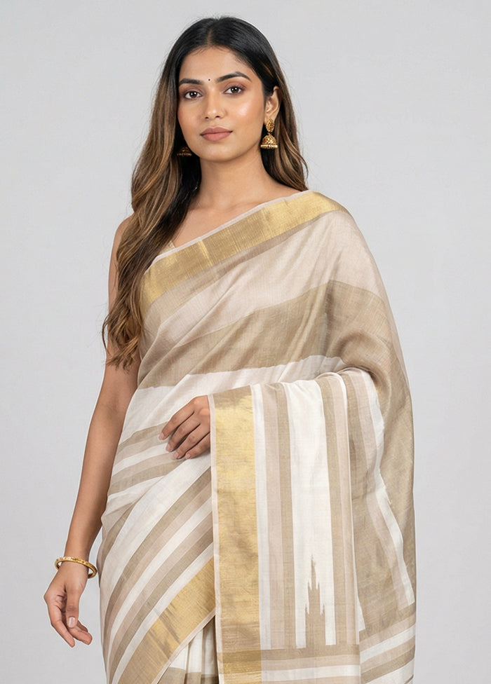 Cream Handloom Tussar Pure Silk Saree With Blouse Piece