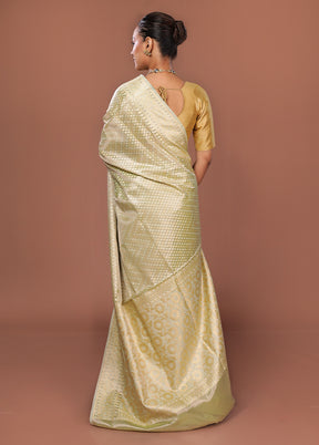 Cream Tissue Silk Saree With Blouse Piece