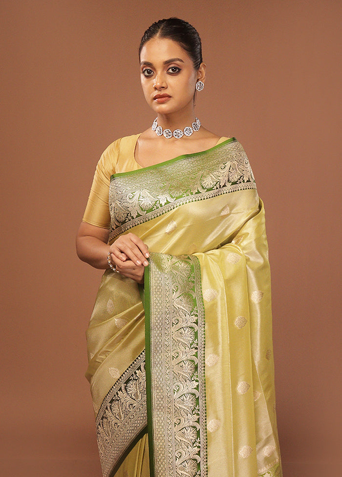 Green Tissue Silk Saree With Blouse Piece