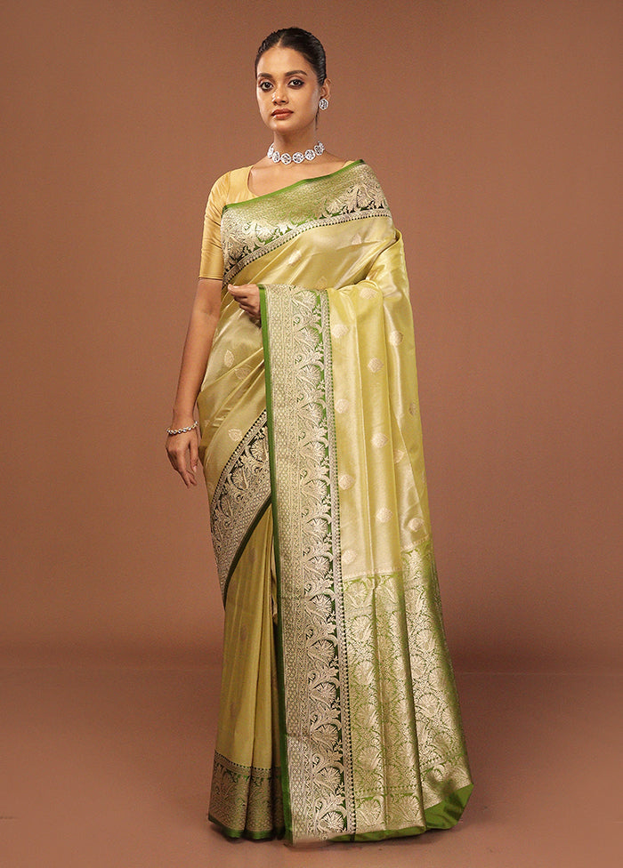 Green Tissue Silk Saree With Blouse Piece