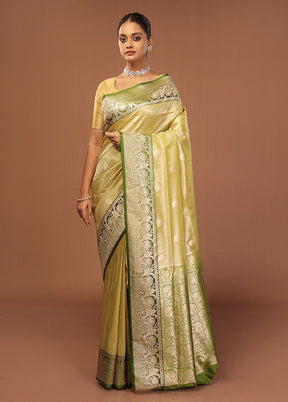 Green Tissue Silk Saree With Blouse Piece