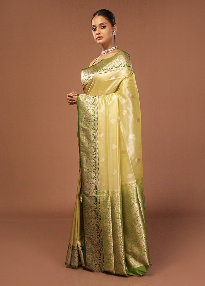 Green Tissue Silk Saree With Blouse Piece