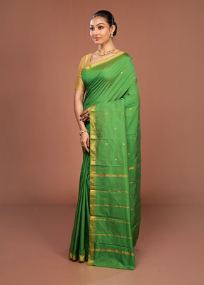 Green Kanjivaram Silk Saree With Blouse Piece
