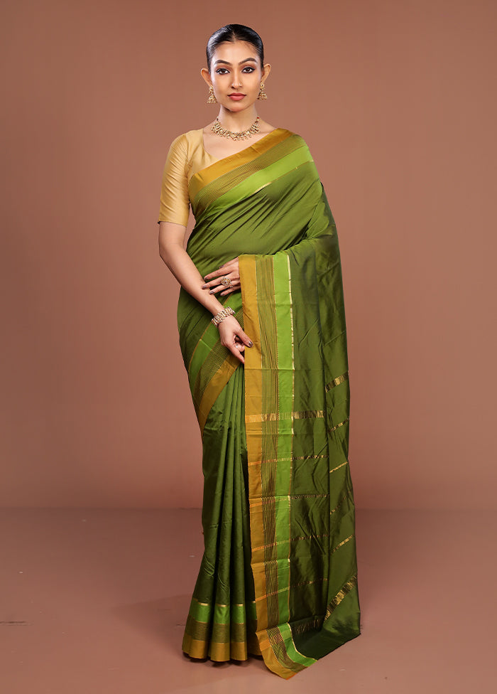 Green Kanjivaram Silk Saree With Blouse Piece