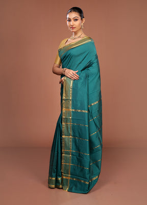 Green Kanjivaram Silk Saree With Blouse Piece