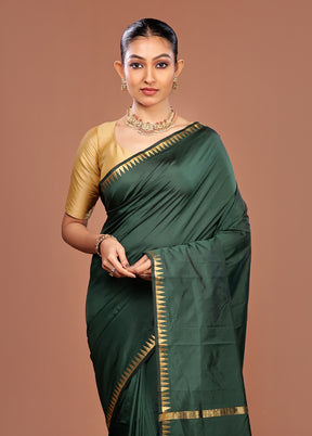Green Kanjivaram Silk Saree With Blouse Piece