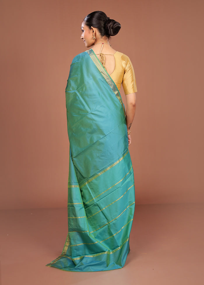Green Kanjivaram Silk Saree With Blouse Piece