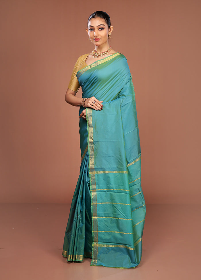 Green Kanjivaram Silk Saree With Blouse Piece