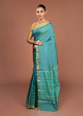 Green Kanjivaram Silk Saree With Blouse Piece