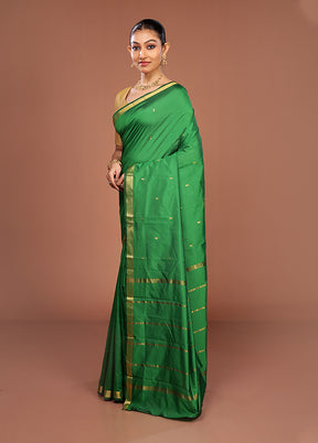 Green Kanjivaram Silk Saree With Blouse Piece