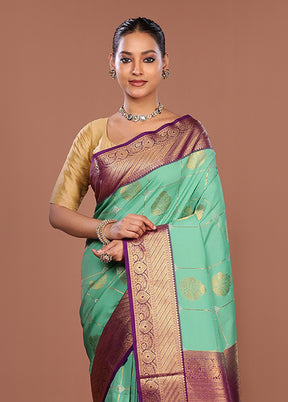 Green Kanjivaram Silk Saree With Blouse Piece
