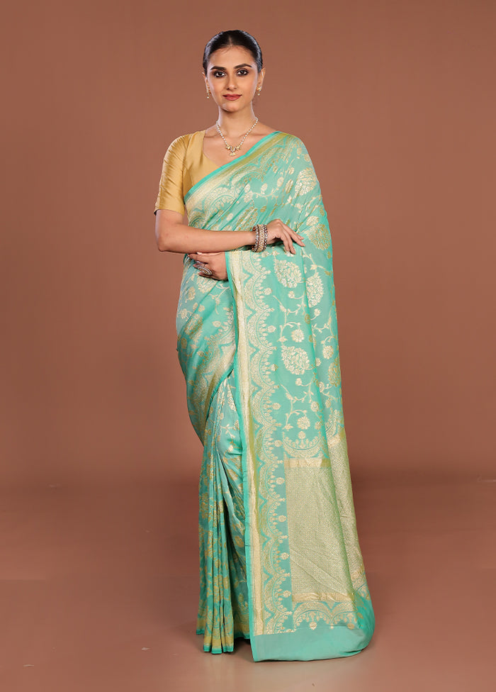 Green Handloom Pure Georgette Saree With Blouse Piece