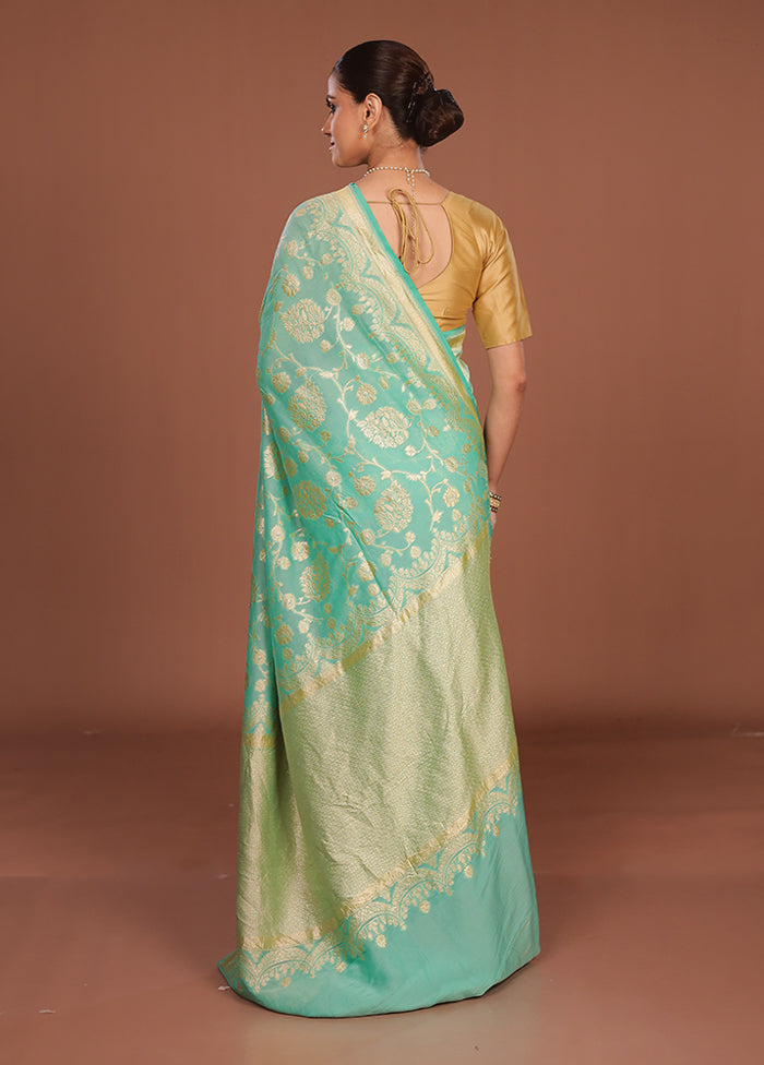 Green Handloom Pure Georgette Saree With Blouse Piece