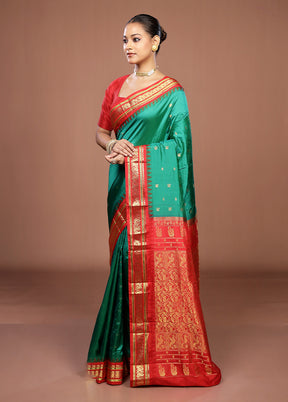 Green Handloom Kanjivaram Pure Silk Saree With Blouse Piece